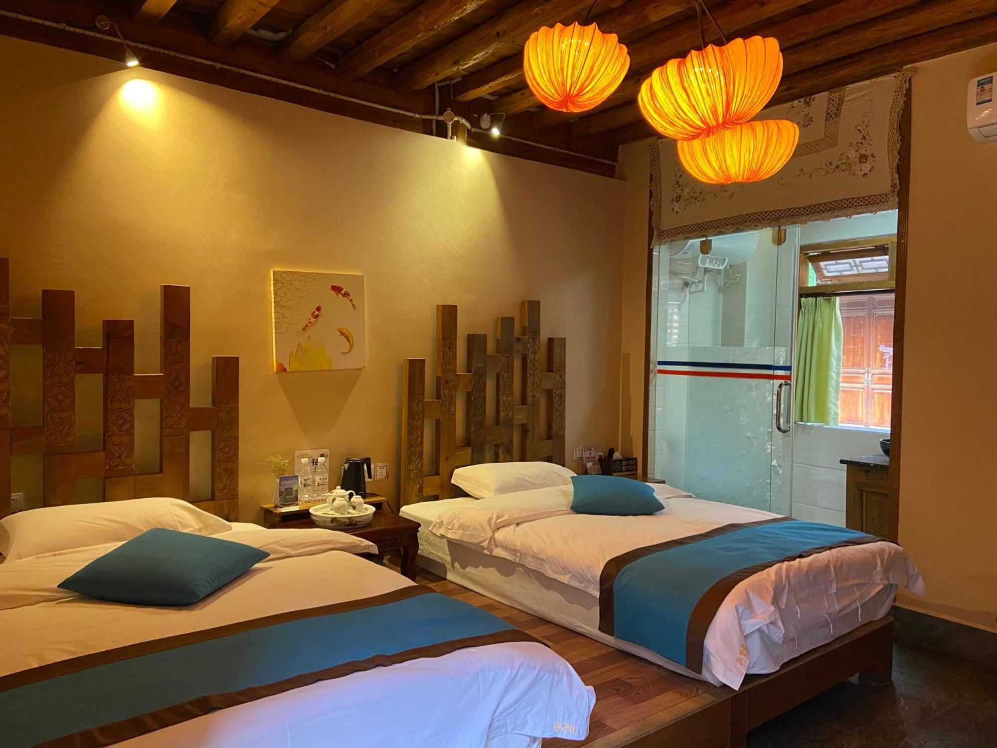 Juxian Boutique Homestay ลี่เจียง ภายนอก รูปภาพ