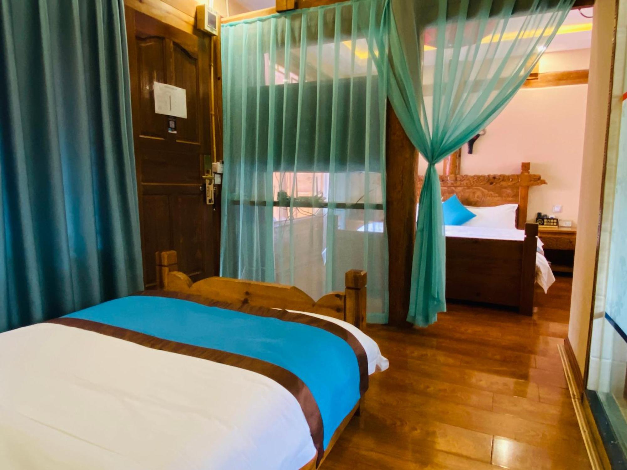 Juxian Boutique Homestay ลี่เจียง ภายนอก รูปภาพ