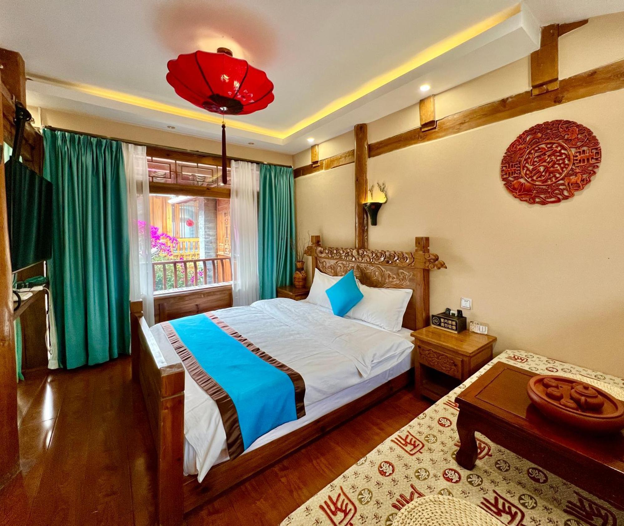 Juxian Boutique Homestay ลี่เจียง ภายนอก รูปภาพ