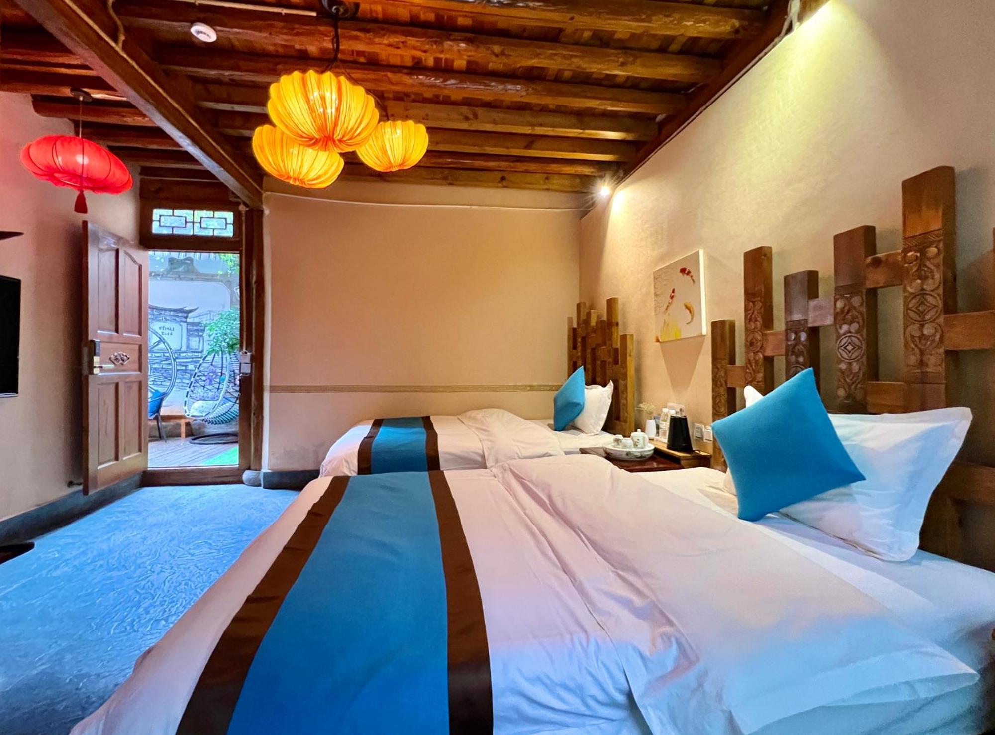 Juxian Boutique Homestay ลี่เจียง ภายนอก รูปภาพ